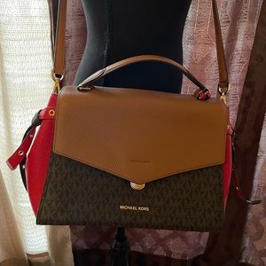 Michael Kors brown, camel & red purse with adjustable strap.